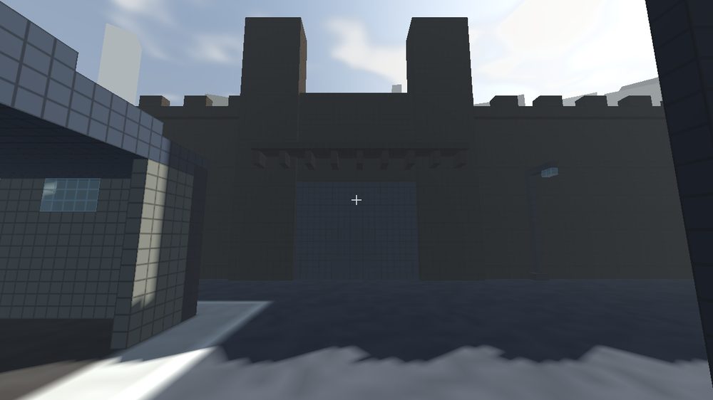 A sealed voxel gatehouse with two flanking towers, seen from inside the walls.