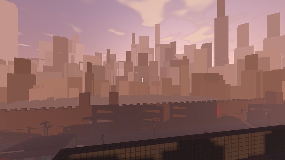 The city at sunset seen over the perimeter wall, sky washed orange and pink.